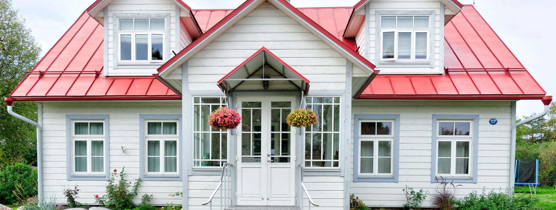 A welcoming rental home with a red roof